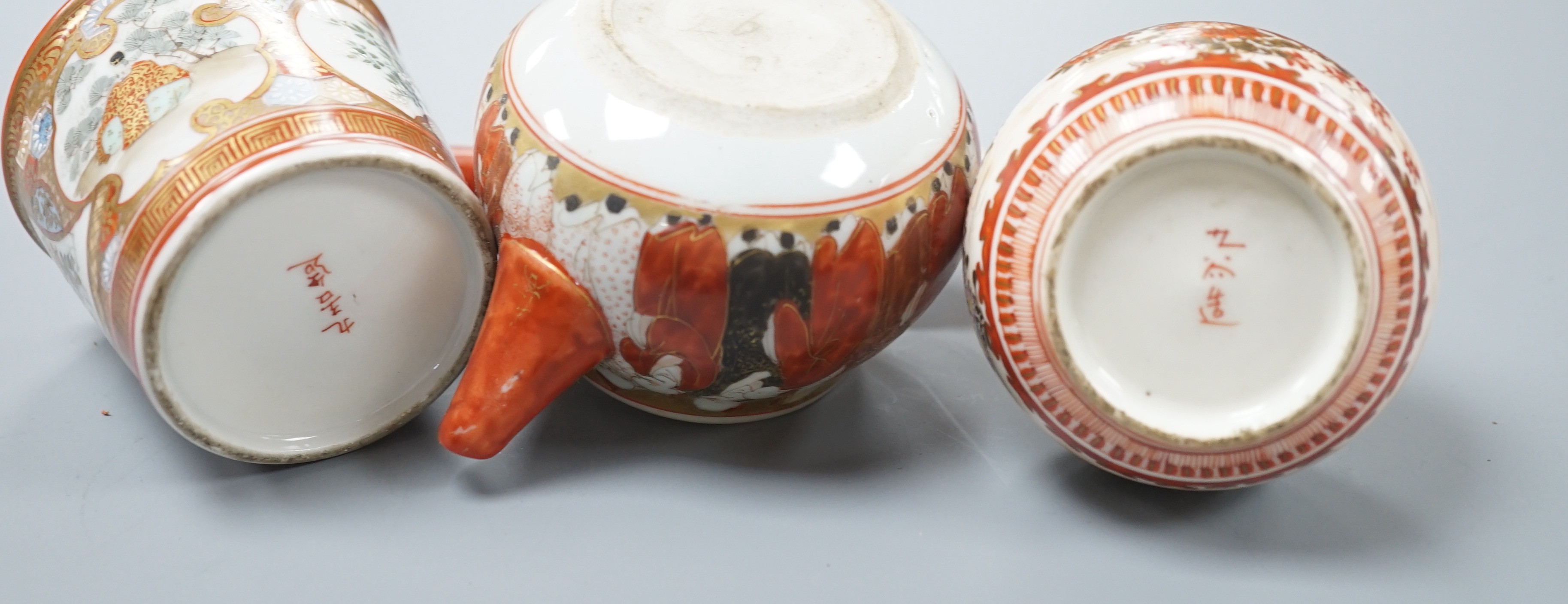 A group of Japanese small or miniature Kutani and Imari vessels and three Satsuma pottery mounted brooches, largest 11.7cm